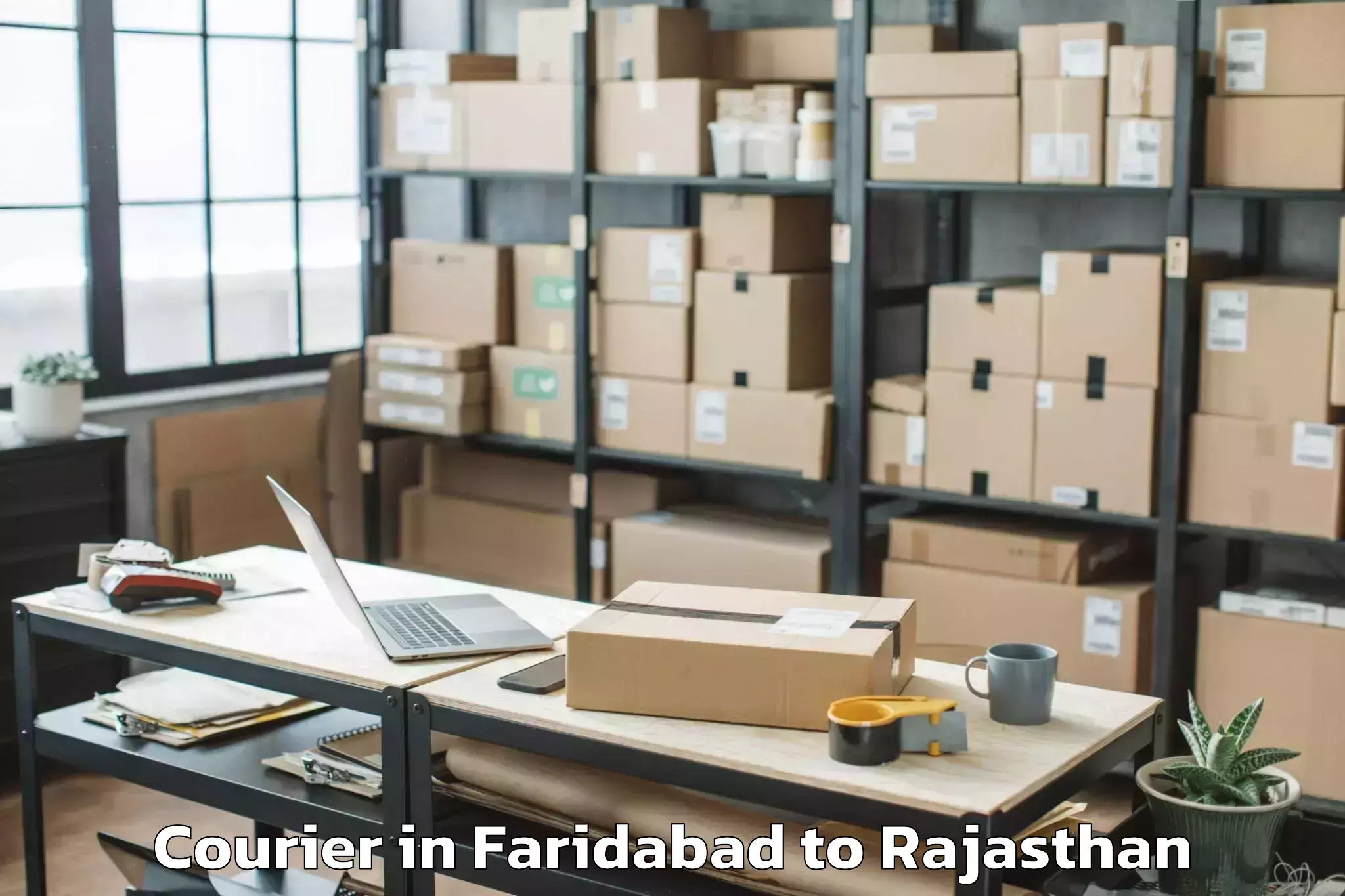 Easy Faridabad to Maulana Azad University Jodhpu Courier Booking